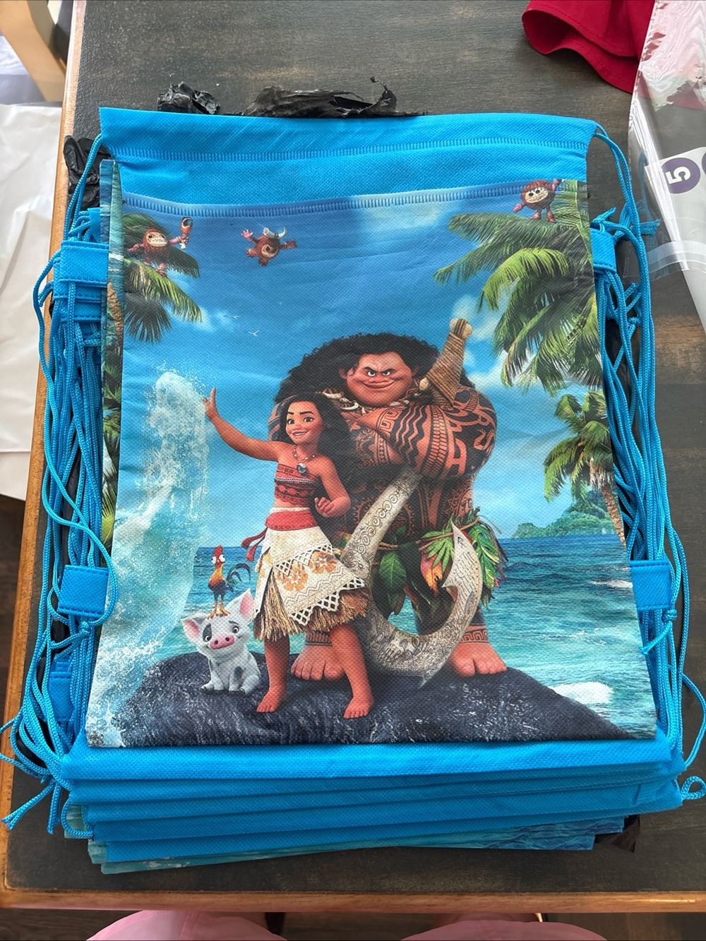 Blue Kids Drawstring Backpack with Moana Character Print 12 total